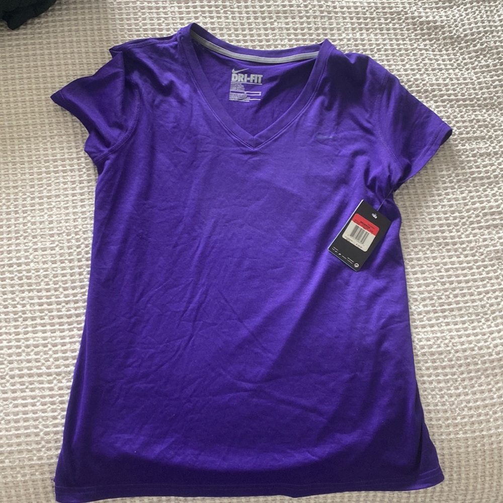 Womens Nike Dri-fit, size large.  Brand new with tags